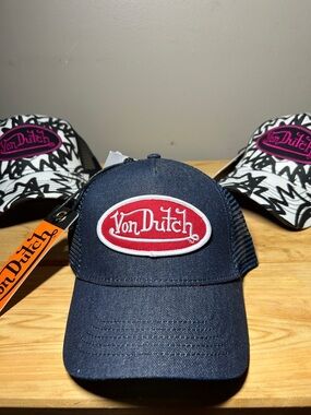 Von Dutch Denim Trucker Hat, a signature  channels early Y2K nostalgia. NWT